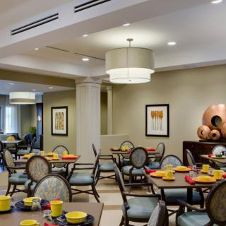 A modern dining room with elegantly set tables and stylish decor.