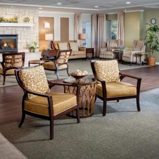 A cozy living room with elegant furniture and a warm atmosphere.