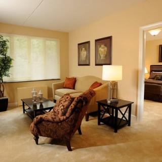A cozy living room with comfortable seating and tasteful decor.