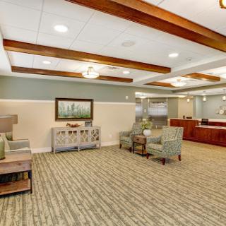 A spacious and inviting lobby featuring comfortable seating and a stylish reception area.