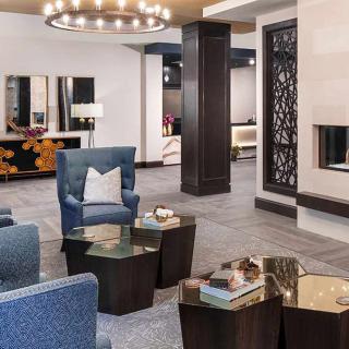 A modern lobby with comfortable seating and stylish decor.