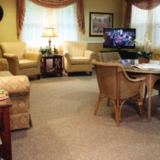 A cozy and inviting living room setting with comfortable seating and warm decor.