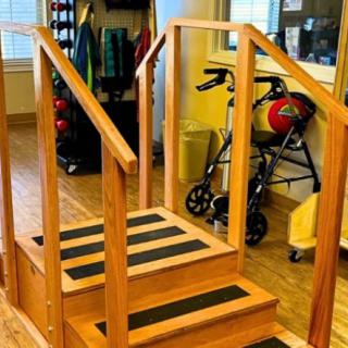 Indoor rehabilitation stairs used for physical therapy exercises.