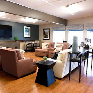 A cozy and modern living room designed for relaxation with comfortable seating and contemporary decor.