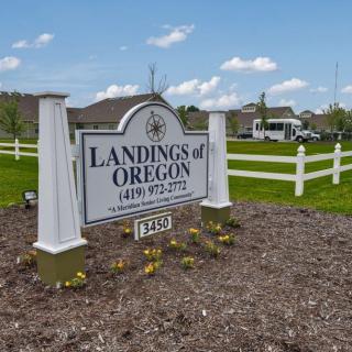 Entrance sign for the Landings of Oregon residential community.