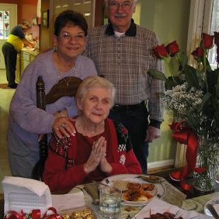 A joyful family gathering around a festive meal, celebrating togetherness and love.