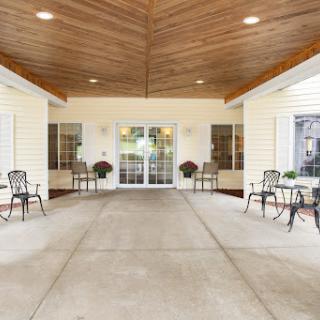 A welcoming entrance with seating arrangements, designed for a comfortable community atmosphere.