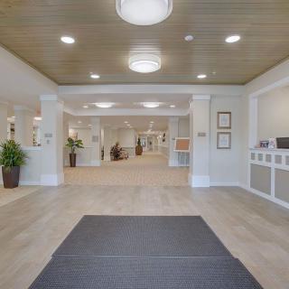 A spacious and modern lobby area with stylish decor and ample lighting.