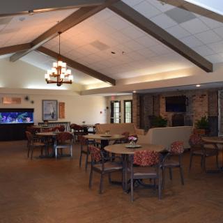 A cozy dining and lounge area featuring comfortable seating and a welcoming atmosphere.