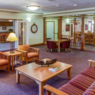 A cozy lobby area with comfortable seating and warm lighting.