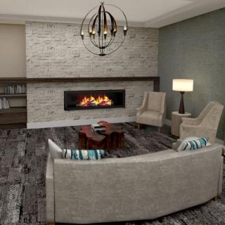 A modern living room with a cozy fireplace and elegant furnishings.