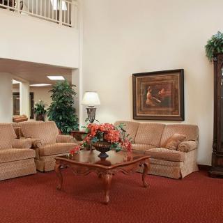 A cozy living room with comfortable seating and stylish decor.