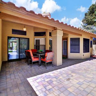 A cozy outdoor patio space perfect for relaxation and gatherings.