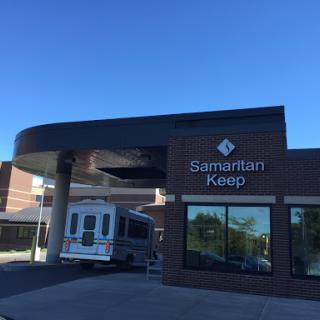 The exterior of the Samaritan Keep healthcare facility on a clear day.