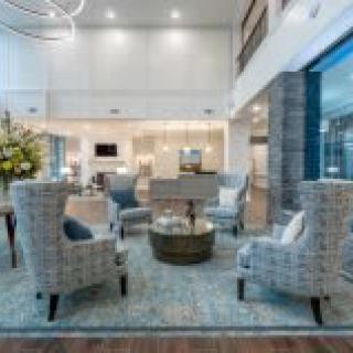 A modern living room with stylish furniture and elegant decor.