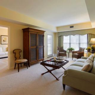A cozy living room with elegant furniture and natural lighting.