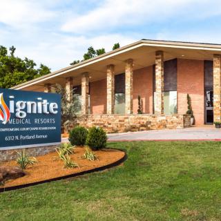 A modern church building with a prominent sign labeled 'Ignite Church' and well-maintained landscaping.