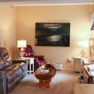 A cozy living room with comfortable seating and stylish decor.