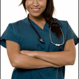 A nurse standing with arms crossed, wearing scrubs and a stethoscope.