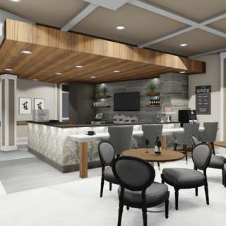 A modern kitchen interior with a seating area and bar counter featuring contemporary design elements and wood accents.
