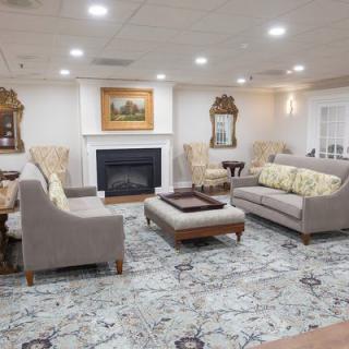 A well-furnished living room with comfortable seating and elegant decor.