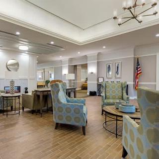 A modern lounge area with comfortable seating and elegant decor.
