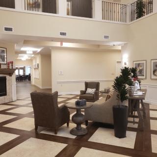 A modern lobby with comfortable seating and elegant decor.