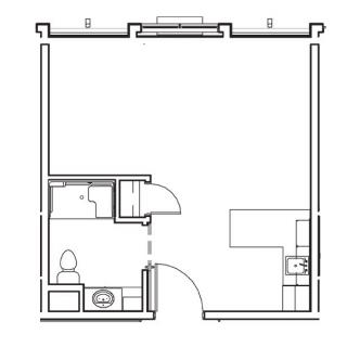 A simple apartment floor plan showing a bathroom, kitchen area, and a large central living space.