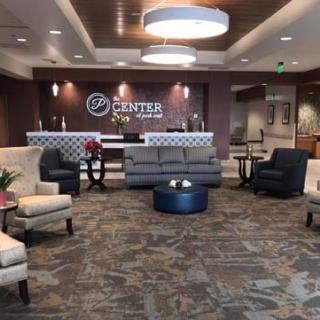 A modern and inviting lobby space featuring a variety of seating options and contemporary design elements.