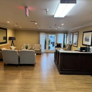 A welcoming lobby with comfortable seating and a reception desk.
