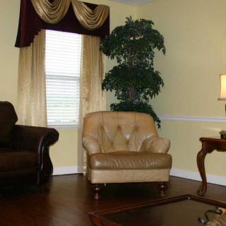 A cozy living room with stylish furniture and elegant decor.