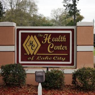 A sign for the Health Center of Lake City.
