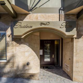 Entrance to a building with decorative signage.