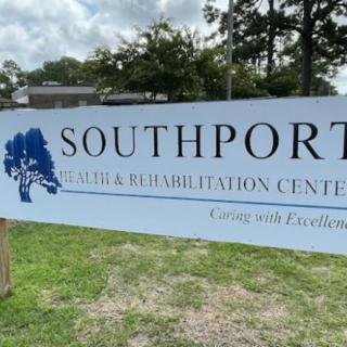 Sign for Southport Health and Rehabilitation Center outdoors.