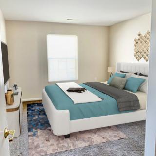 A modern and stylish bedroom with a neatly made bed, soft lighting, and elegant decor.