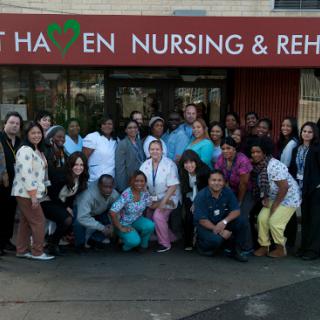 Healthcare team gathered in front of Haven Nursing & Rehabilitation.