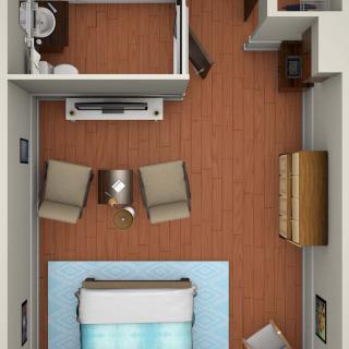 A top view of a bedroom layout featuring a bed, two chairs, and various pieces of furniture.