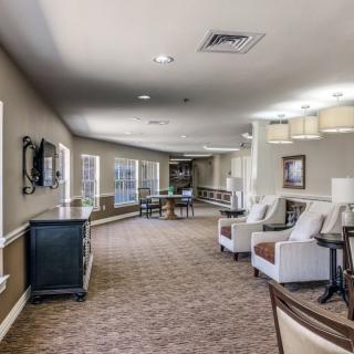 A spacious lobby area with comfortable seating and modern decor.