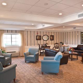 A cozy lounge area featuring comfortable seating and a welcoming atmosphere.