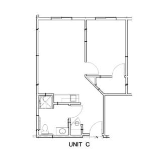 A floor plan labeled as Unit C, showing the layout of rooms and walls.