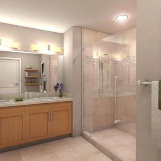 A modern bathroom featuring a glass-enclosed shower and a wooden vanity with an illuminated mirror.