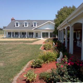 A beautiful residential home with a well-maintained garden.