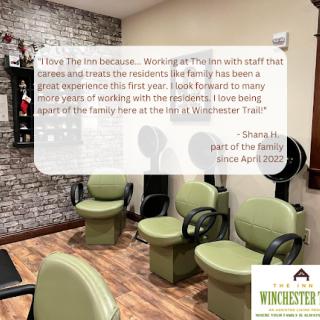 A cozy waiting area in a salon designed for relaxation and comfort.
