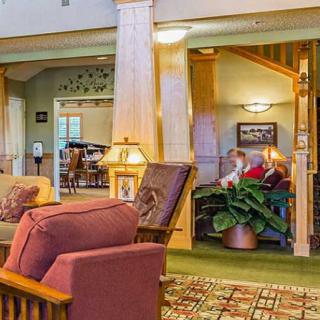 A cozy seating area in a well-decorated living space with comfortable furniture.