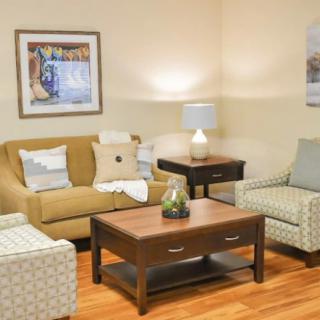 A cozy living room with comfortable seating and tasteful decor.