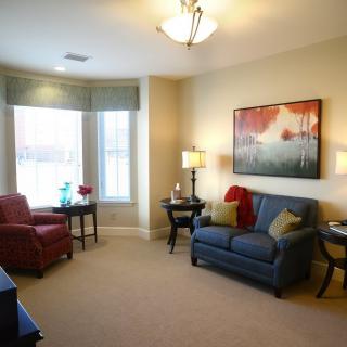 A cozy living room with comfortable seating and tasteful decor.