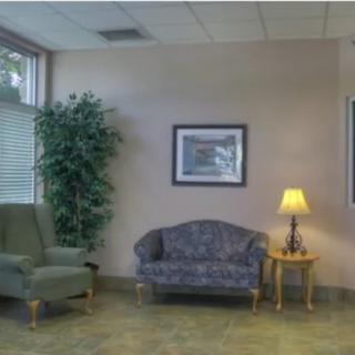 A quiet waiting room with comfortable seating.