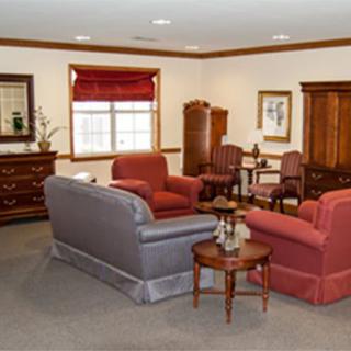 A cozy living room with comfortable seating and warm decor.