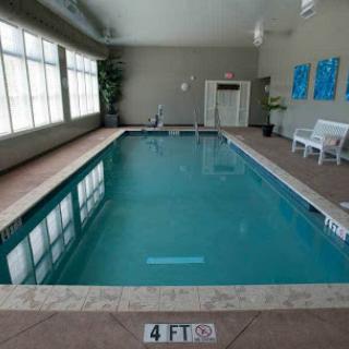 A serene indoor swimming pool, perfect for relaxation and fitness.