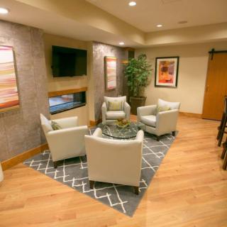 Cozy seating area with modern decor and soft lighting.